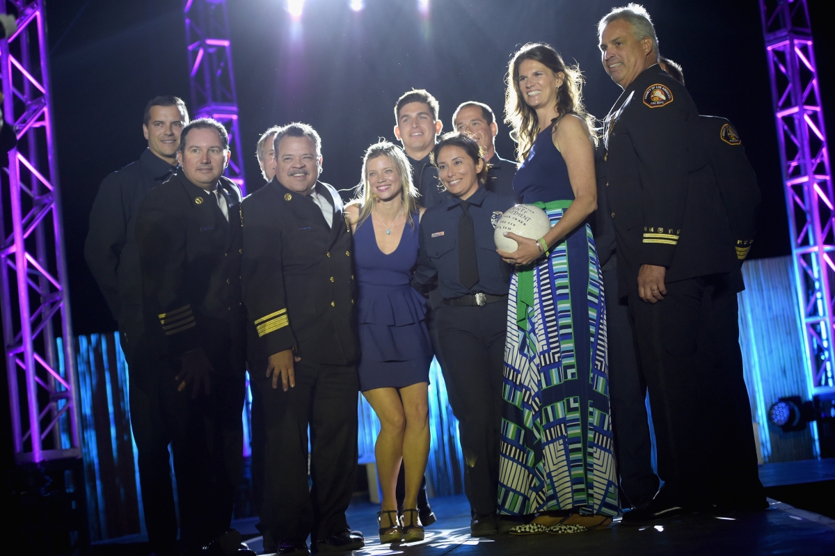 LA County Lifeguards accept their award with Heal the Bay President Alix Hobbs at Bring Back the Beach Gala
