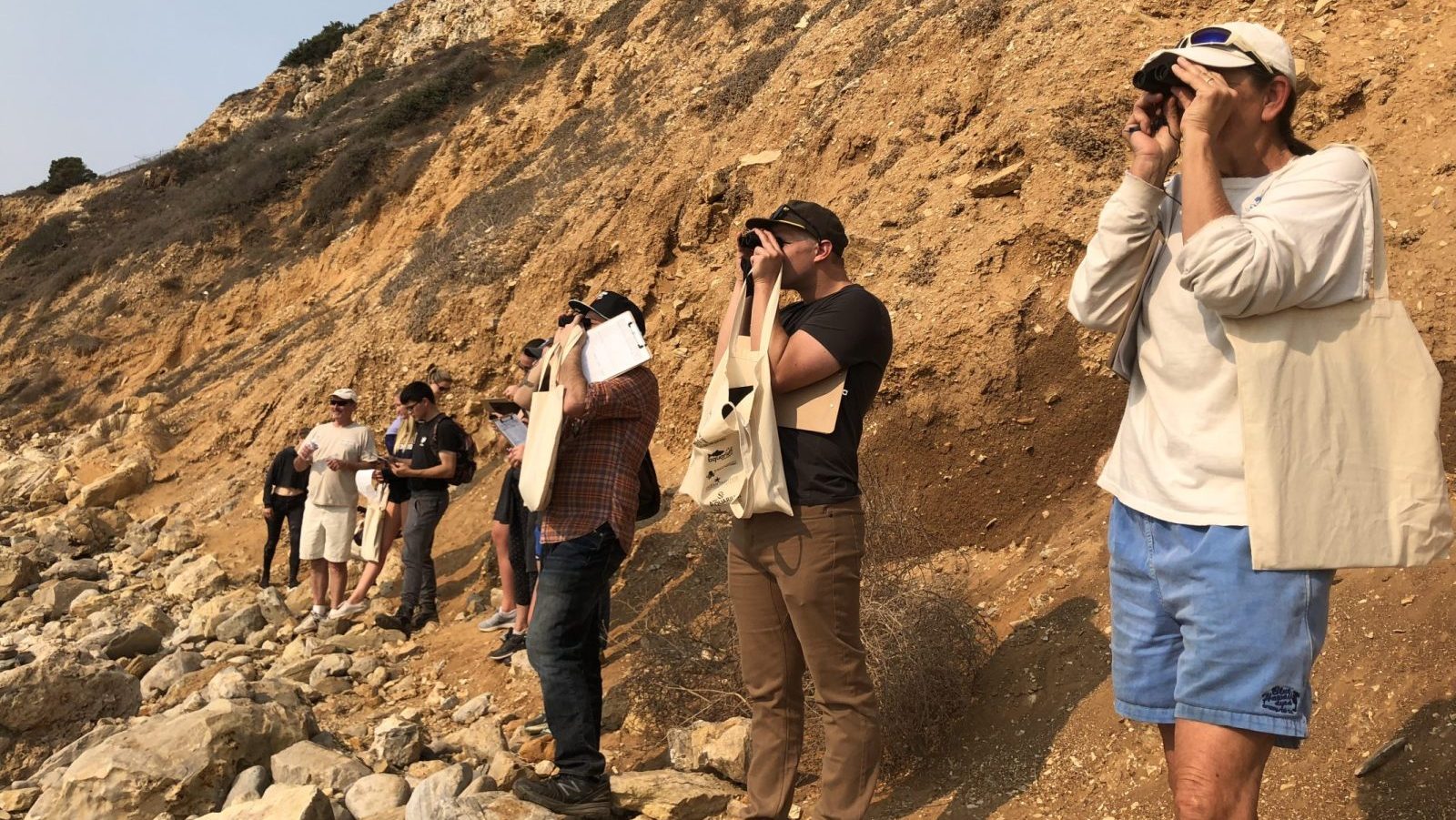 MPA Watch Volunteers viewing the ocean through binoculars